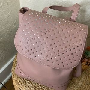 Pink studded backpack